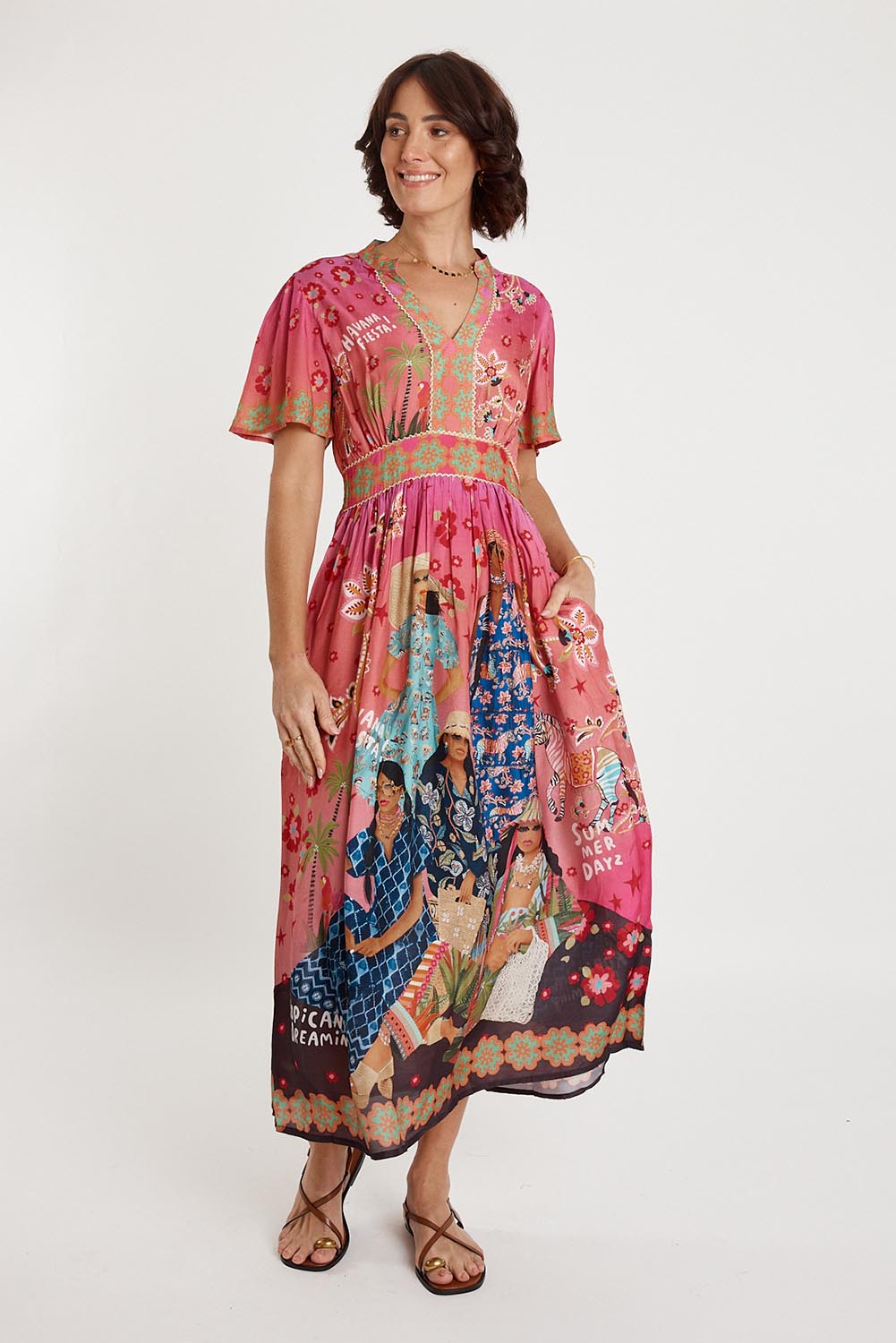 A model wearing the Fiesta Modal Blend Dress in colour Print (Pink), from the front, showing the whole outfit
