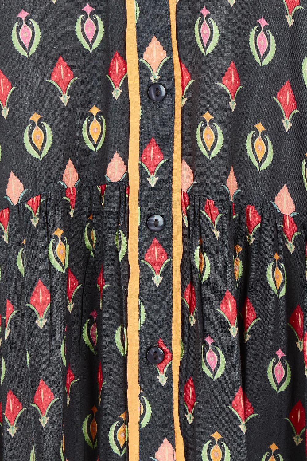 Product shot of the Grenadine Dress in colour Truffle, detail