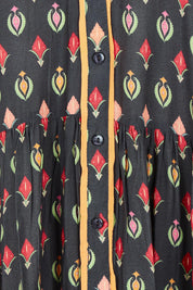 Product shot of the Grenadine Dress in colour Truffle, detail