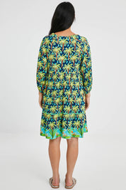 Model Katie wearing size S of the Haiti Tiered Dress in colour Navy (Blue), from the back