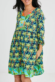 Model Katie wearing size S of the Haiti Tiered Dress in colour Navy (Blue), from the front, cropped image