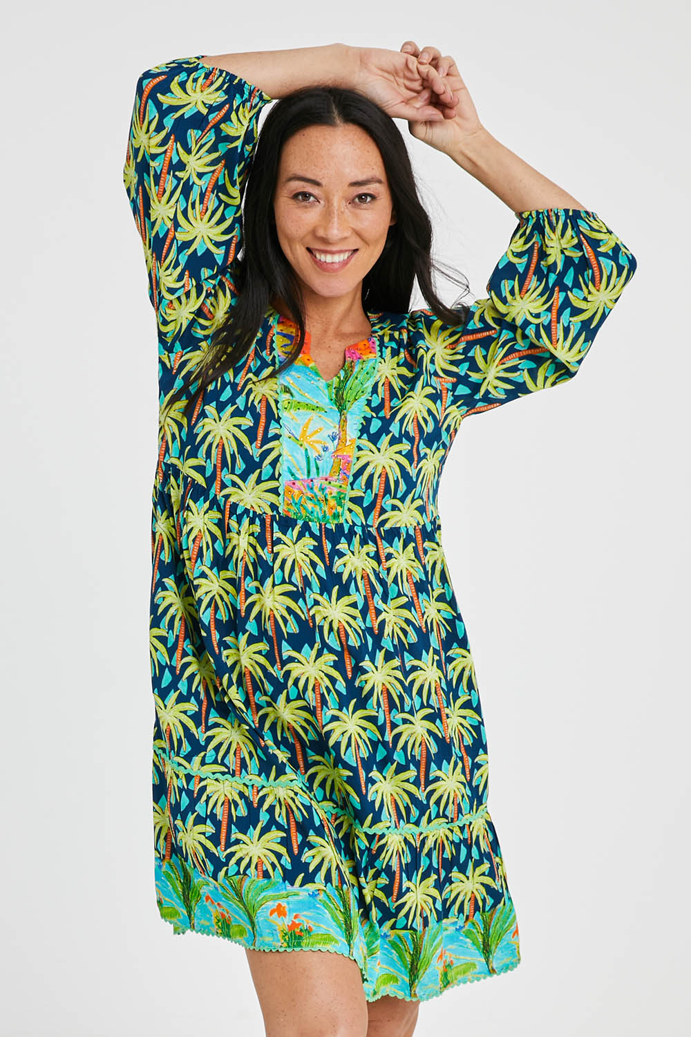 Model Katie wearing size S of the Haiti Tiered Dress in colour Navy (Blue), from the front, cropped image