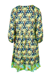 Product shot of the Haiti Tiered Dress in colour Navy (Blue), from the back