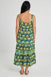 Model Katie wearing size S of the Haiti Sundress in colour Navy (Blue), from the back