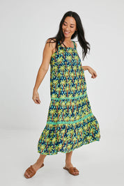 Model Katie wearing size S of the Haiti Sundress in colour Navy (Blue), from the front, showing the whole outfit