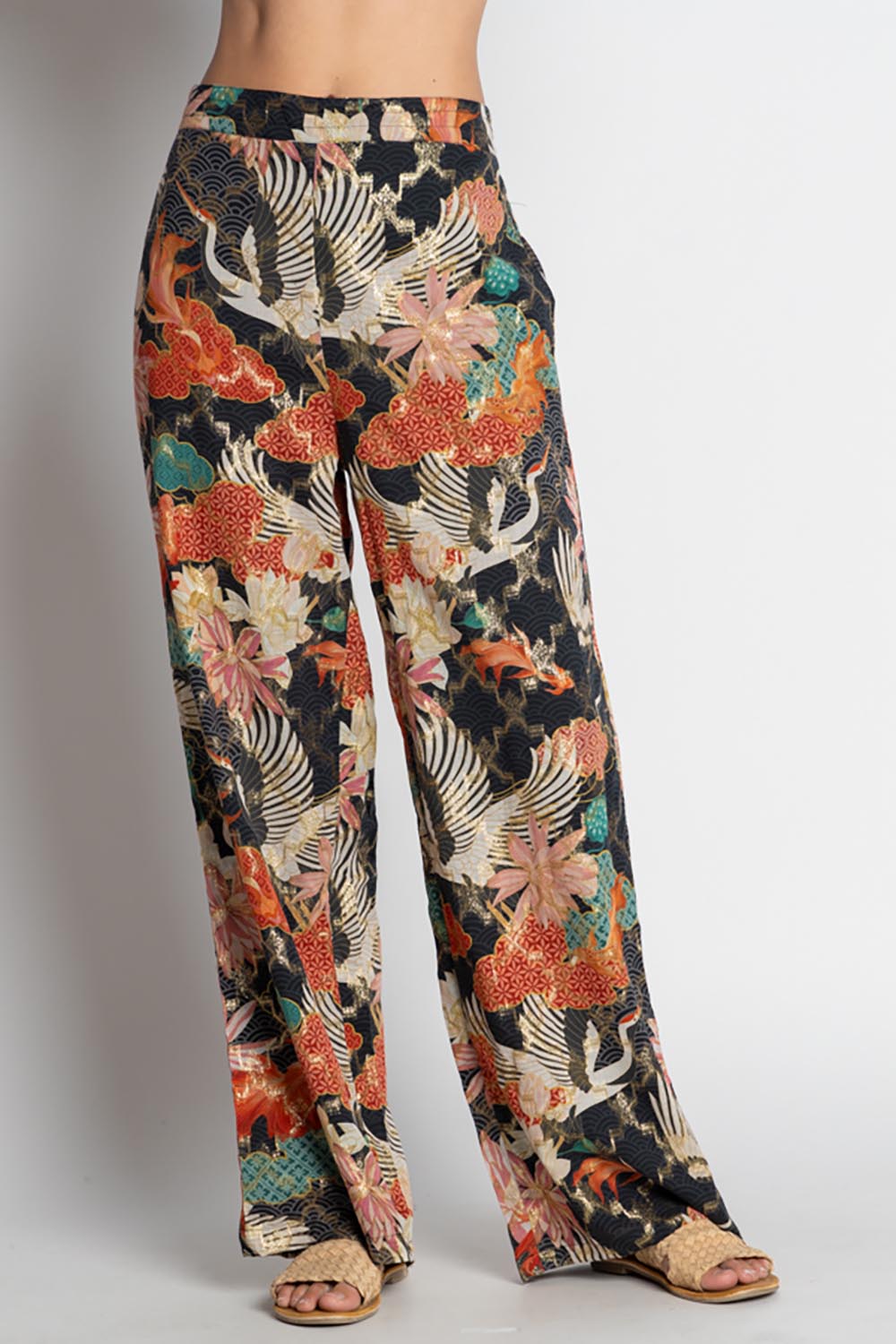 A model wearing the Hoshino Pant in colour Black, from the front, cropped image