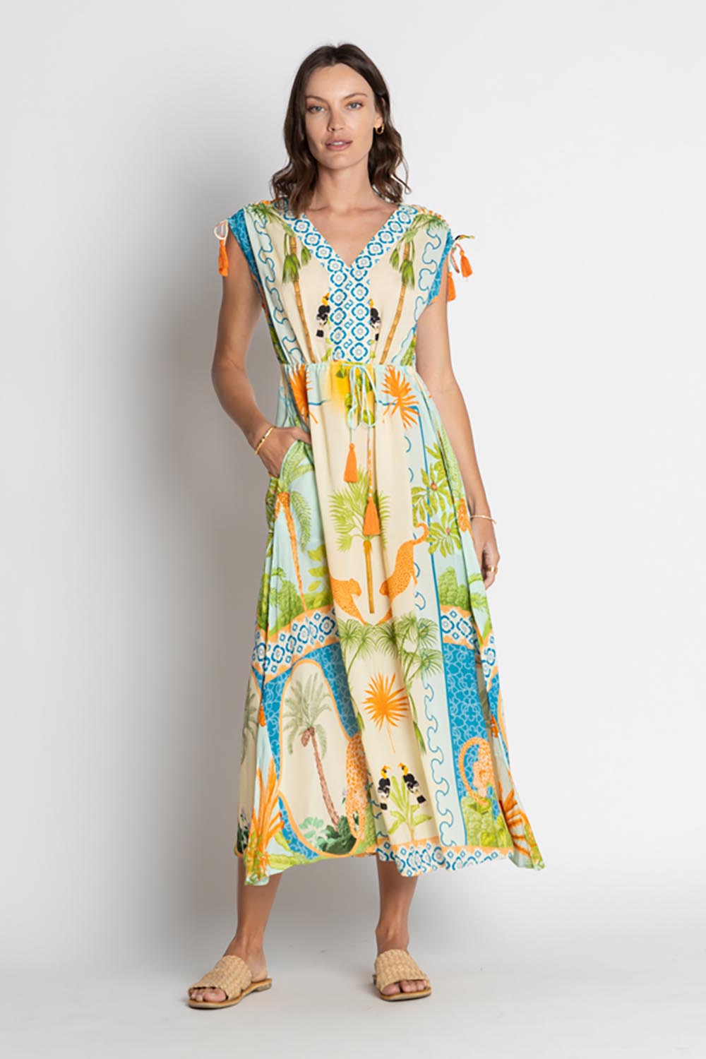 A model wearing the Kahala Midi Dress in colour Mist, from the front, showing the whole outfit