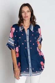 A model wearing the Ladera Kaftan Shirt in colour Navy (Blue), from the front, cropped image