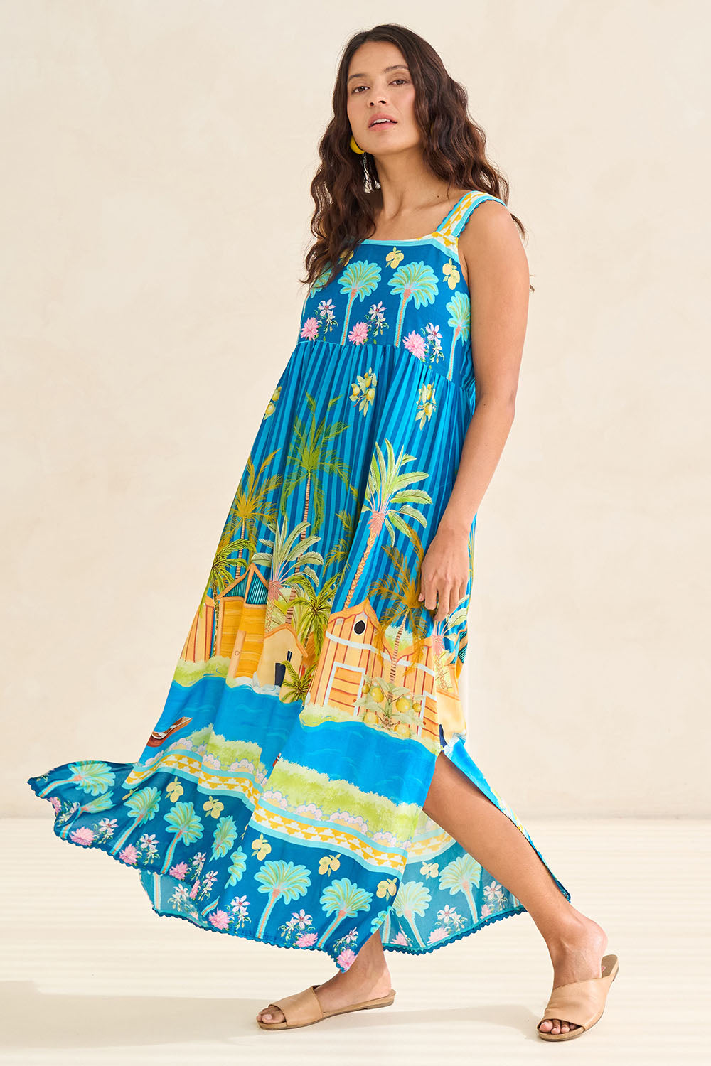 Model Tahnee wearing size S of the Mardiva Sundress in colour Ocean, from the front, showing the whole outfit