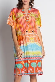 A model wearing the Mardiva Shift Dress in colour Melon, from the front, cropped image