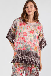 Model Genericm wearing size sample of the La Maroma Wide Tee – Espresso in colour Espresso, in a cropped view