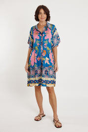 A model wearing the Marquis Modal Blend Dress in colour Ocean (Blue), from the front, showing the whole outfit