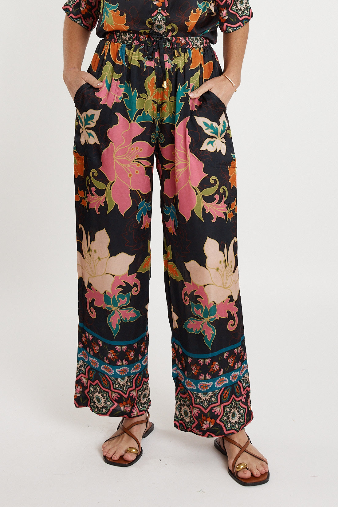 A model wearing the Marquis Modal Blend Pant in colour Black (Black), from the front, cropped image