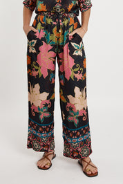 A model wearing the Marquis Modal Blend Pant in colour Black (Black), from the front, cropped image