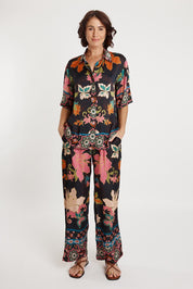 A model wearing the Marquis Modal Blend Pant in colour Black (Black), from the front, showing the whole outfit