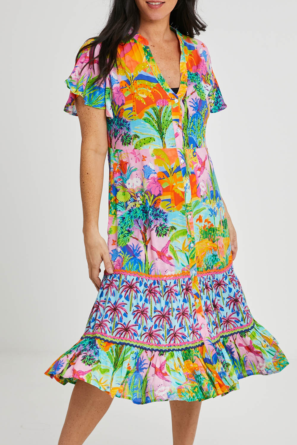 Model Katie wearing size S of the Mirage Dress in colour Print (Blue), from the front, cropped image