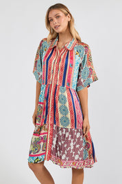 Model Genericm wearing size sample of the Miramar Dress - Print in colour Print, in a cropped view