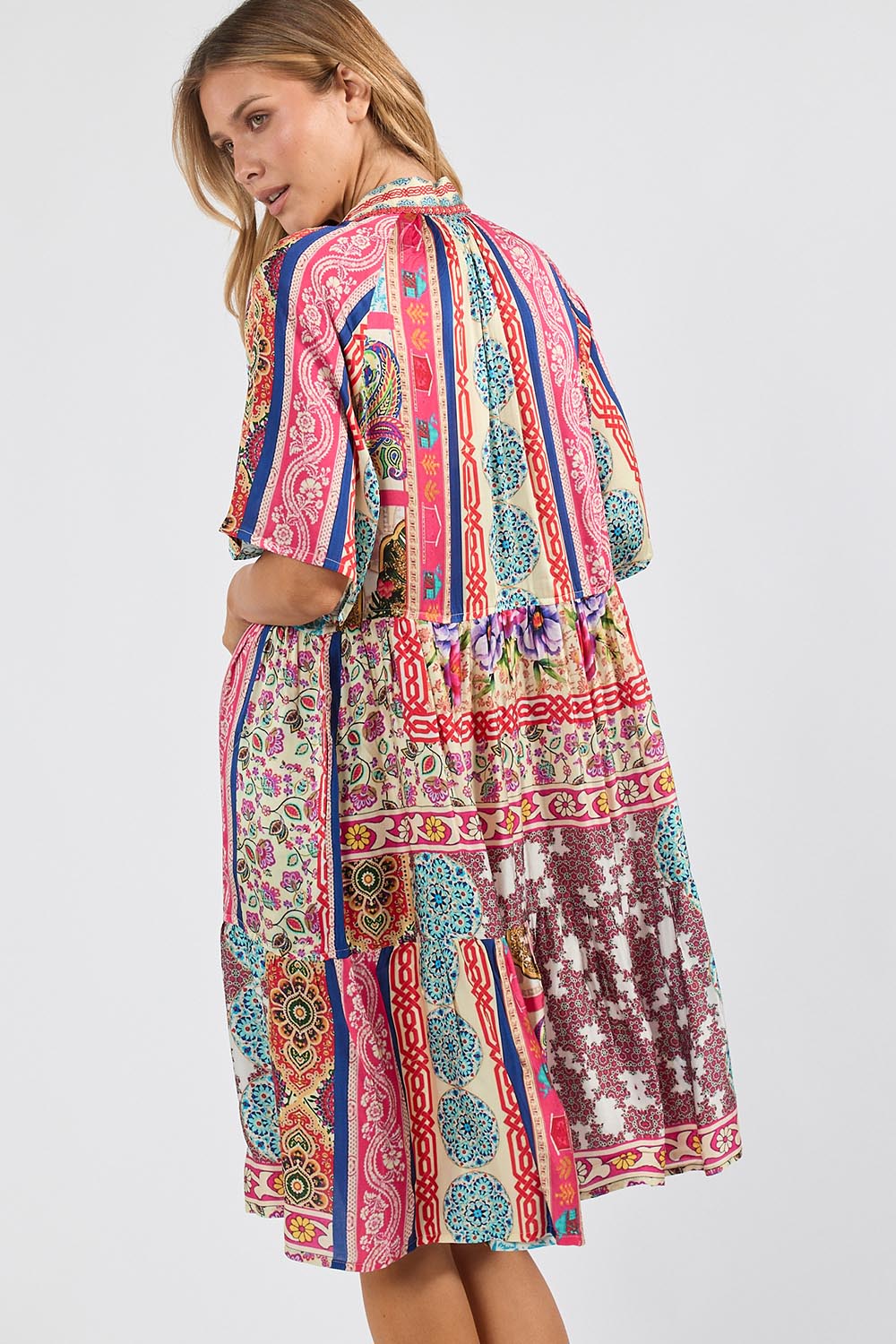 Model Genericm wearing size sample of the Miramar Dress - Print in colour Print, from the front