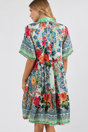 Model Genericm wearing size sample of the Miraval Dress – Mint in colour Mint, from the back