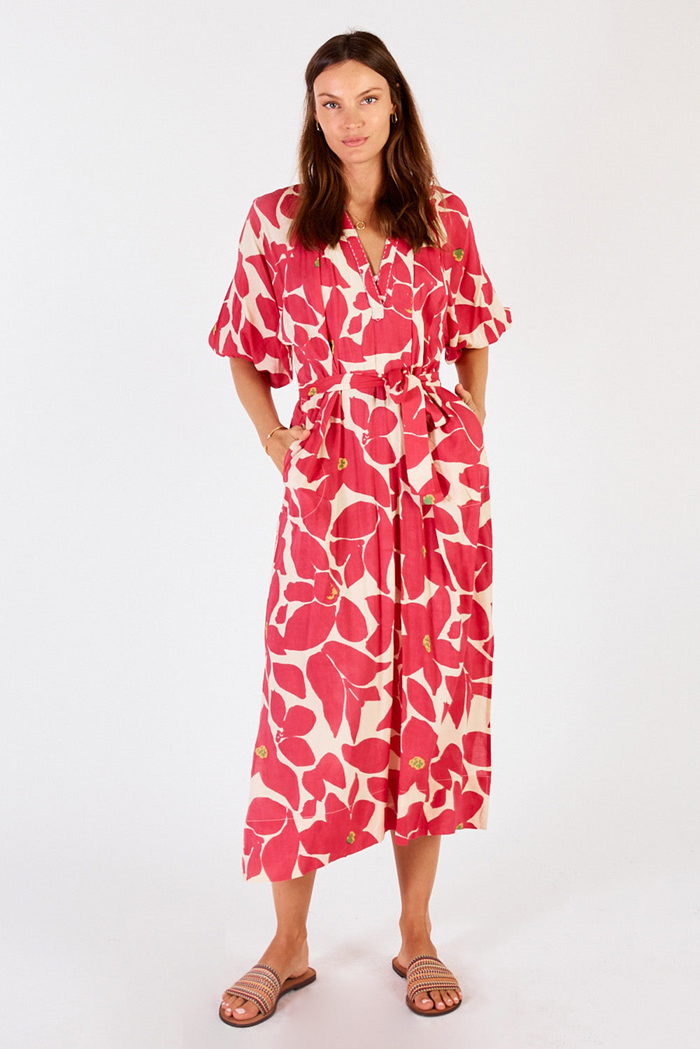 A model wearing the Monte Midi Dress in colour Raspberry (Red), from the front, showing the whole outfit