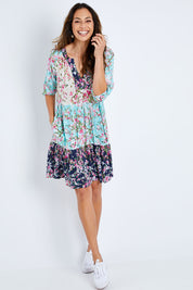 Model Amanda wearing size S of the Myoshi Dress in colour Multi (Blue), from the front, showing the whole outfit