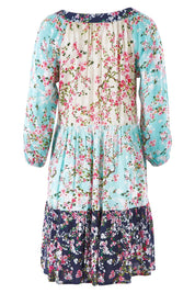 Product shot of the Myoshi Dress in colour Multi (Blue), from the back