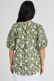 Model Katie wearing size S of the Natura Top in colour Khaki (Green), from the back