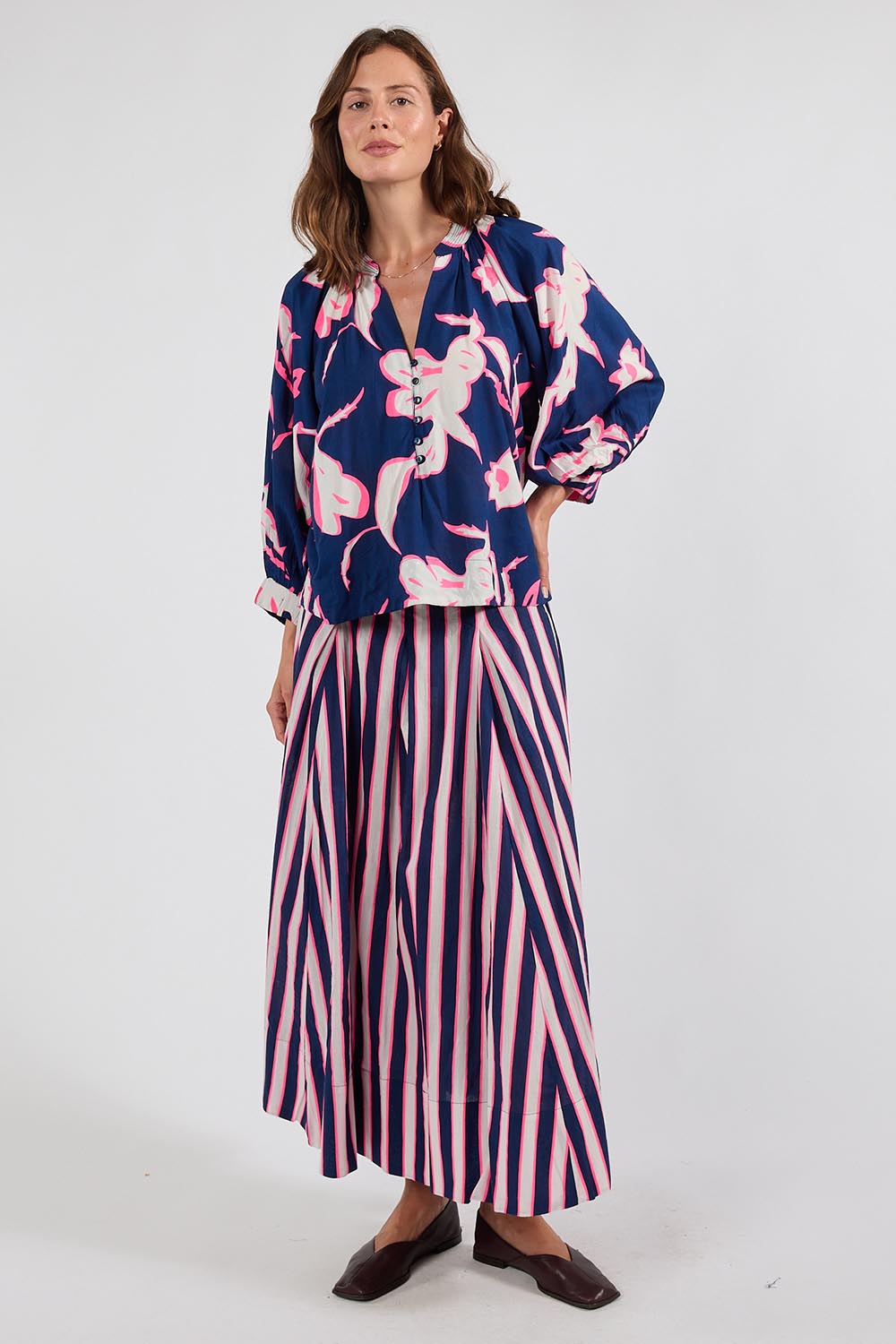 Model Genericm wearing size sample of the Palmilla Stripe Skirt – Navy in colour Navy, from the front