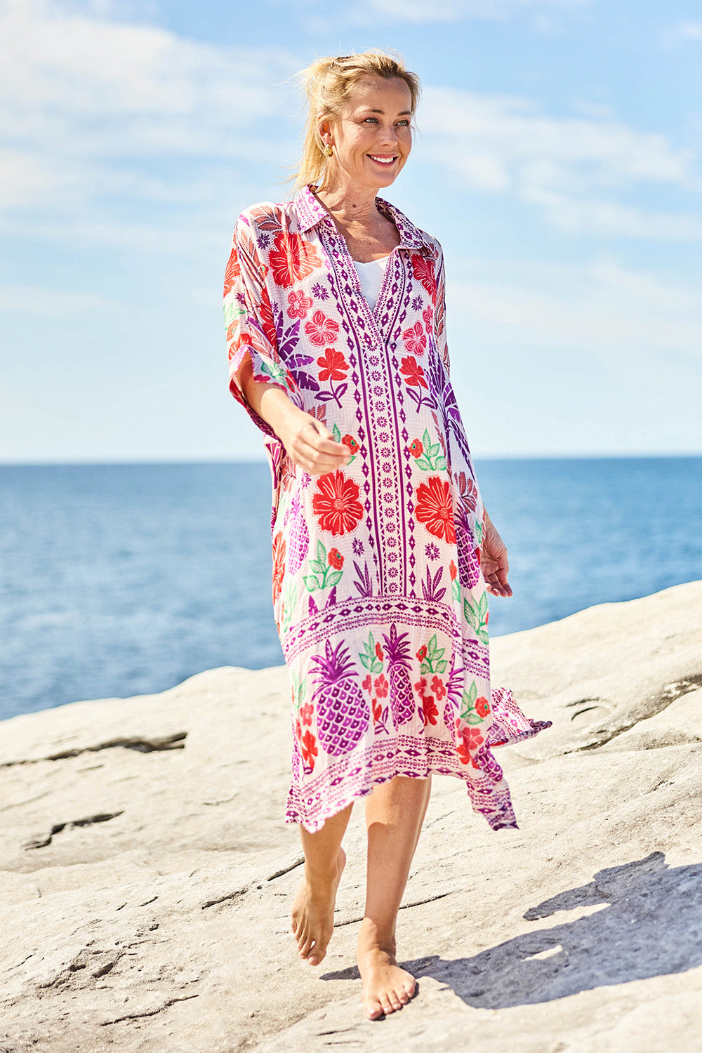 Model Bianca wearing size S of the Parisio Modal Blend Kaftan in colour Fuchsia (Purple), from the front, showing the whole outfit