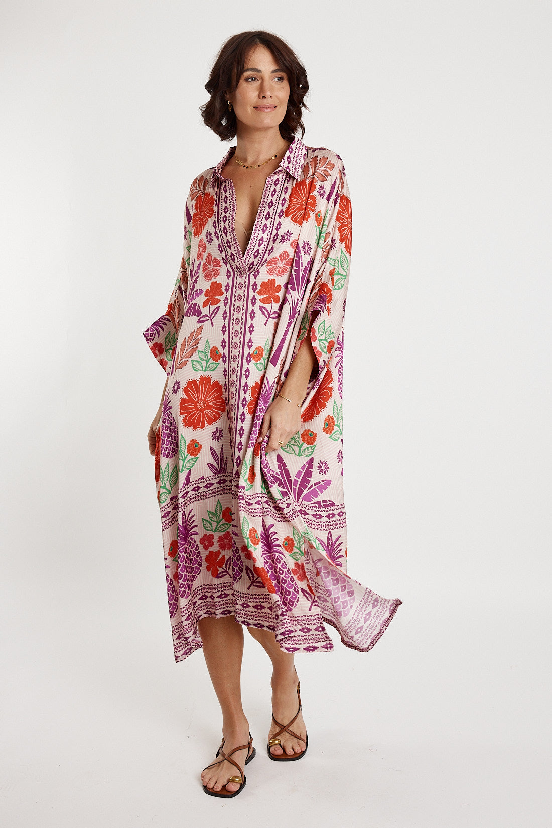 A model wearing the Parisio Modal Blend Kaftan in colour Fuchsia (Purple), from the front, showing the whole outfit