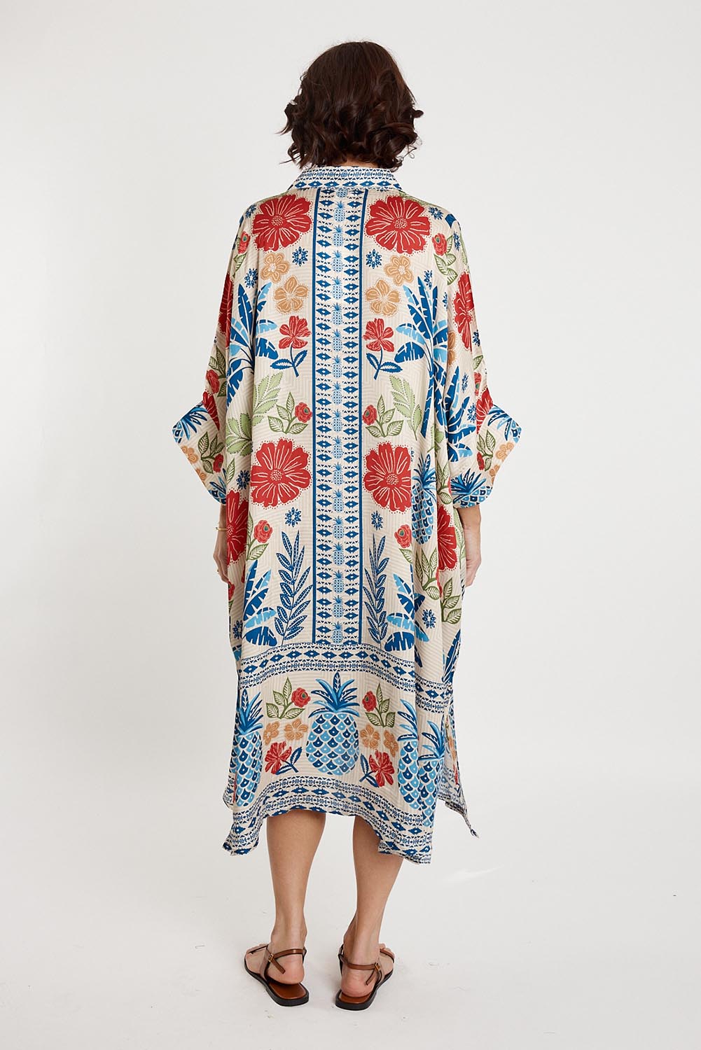 A model wearing the Parisio Modal Blend Kaftan in colour Navy (Blue), from the back