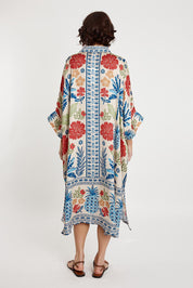 A model wearing the Parisio Modal Blend Kaftan in colour Navy (Blue), from the back