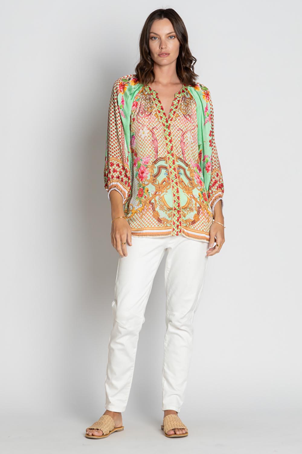 A model wearing the Pellicano Top in colour Mint, from the front, showing the whole outfit