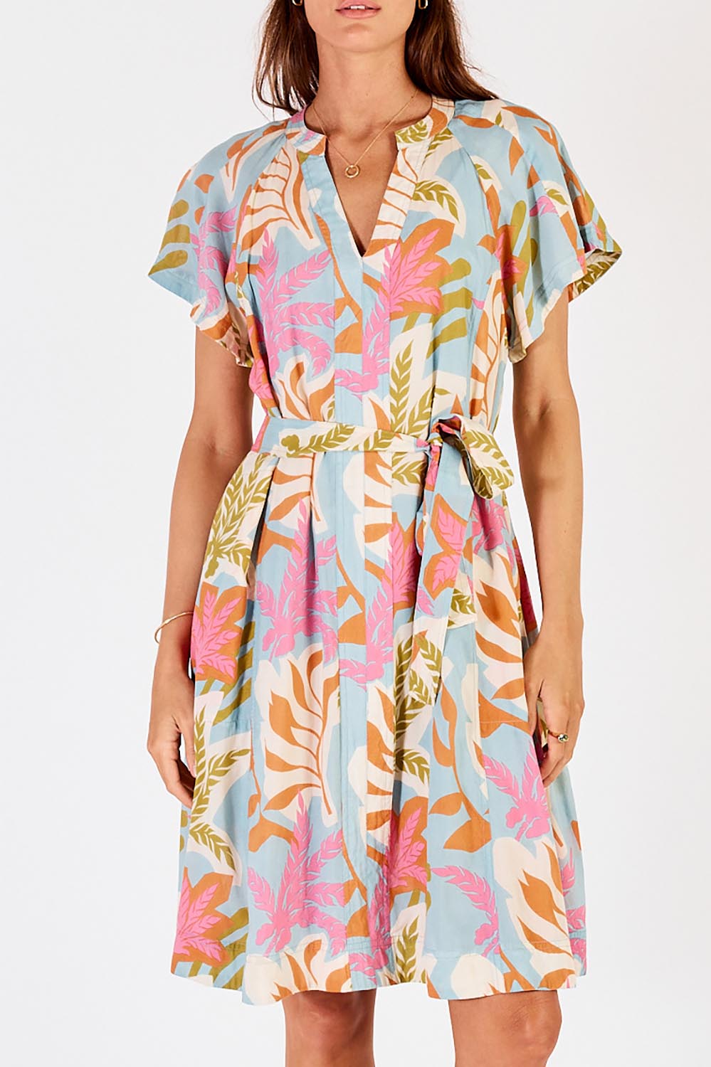 A model wearing the Portabella Dress in colour Cloud (Blue), from the front, cropped image