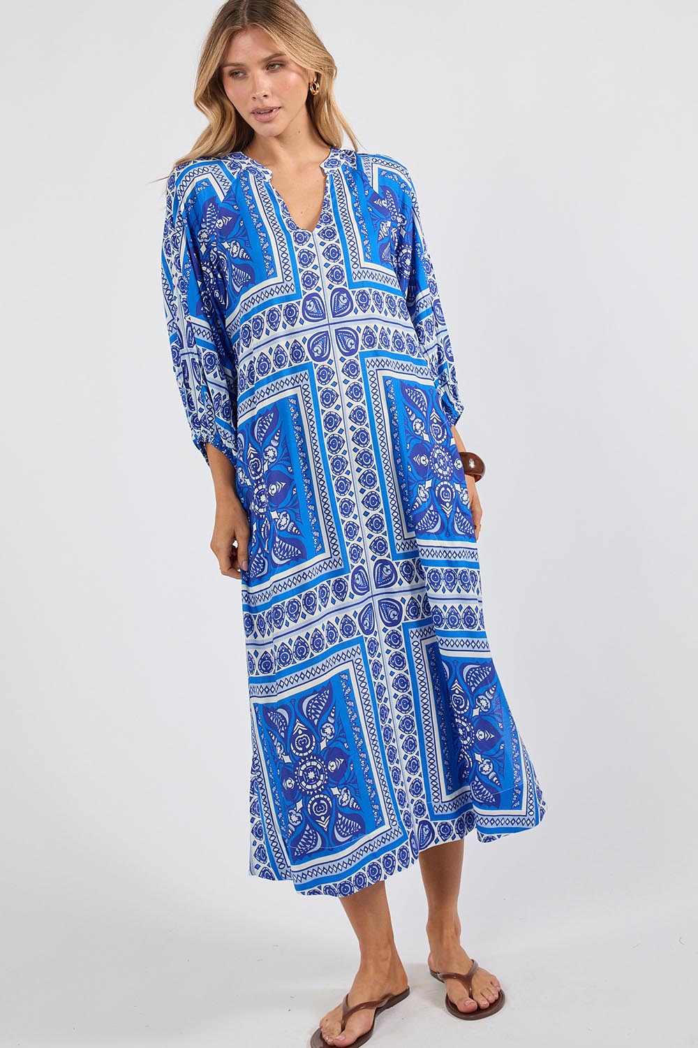 Model Genericm wearing size sample of the Samora Kaftan Dress – Ocean in colour Ocean, from the front