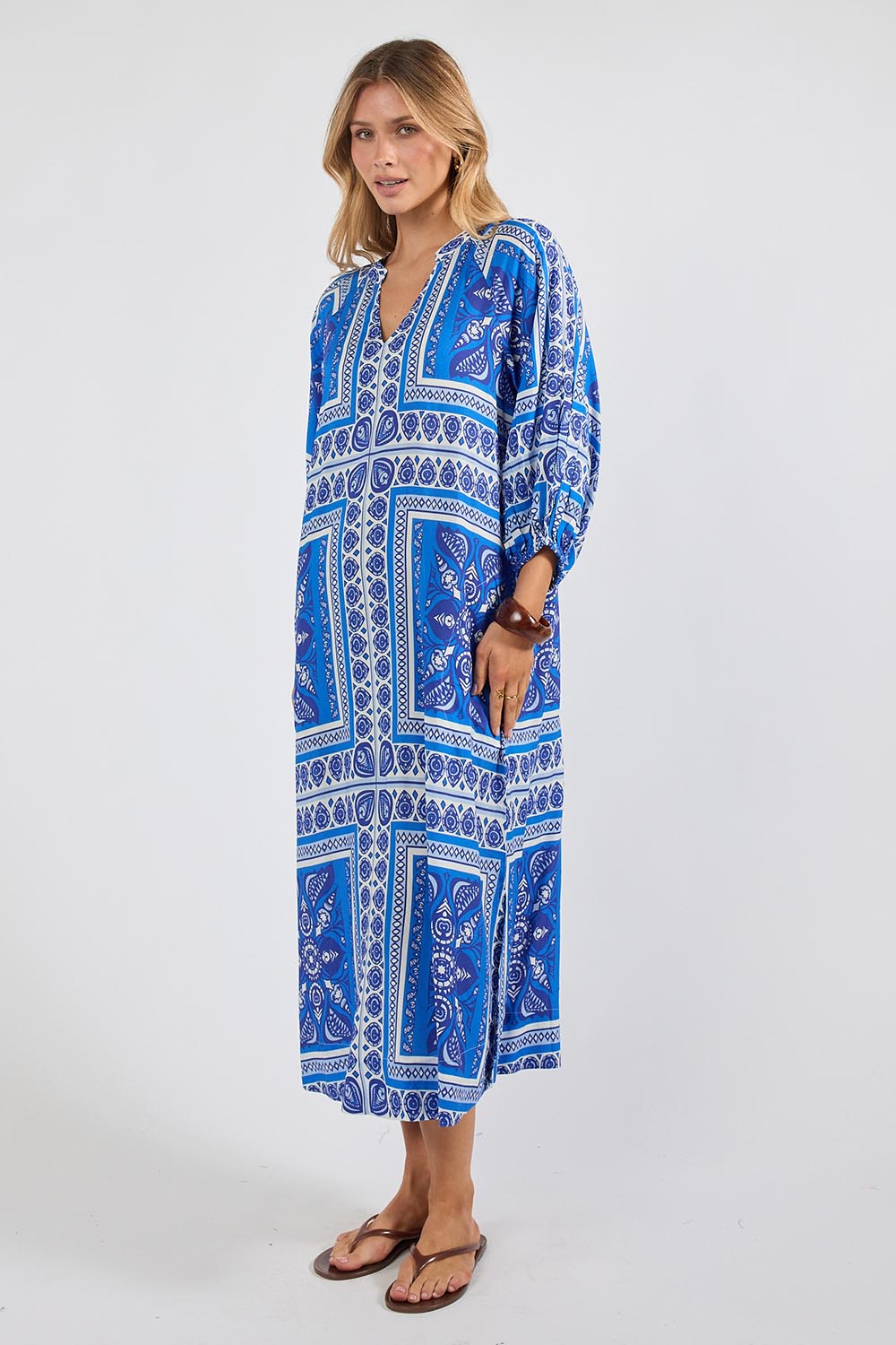 Model Genericm wearing size sample of the Samora Kaftan Dress – Ocean in colour Ocean, from the front