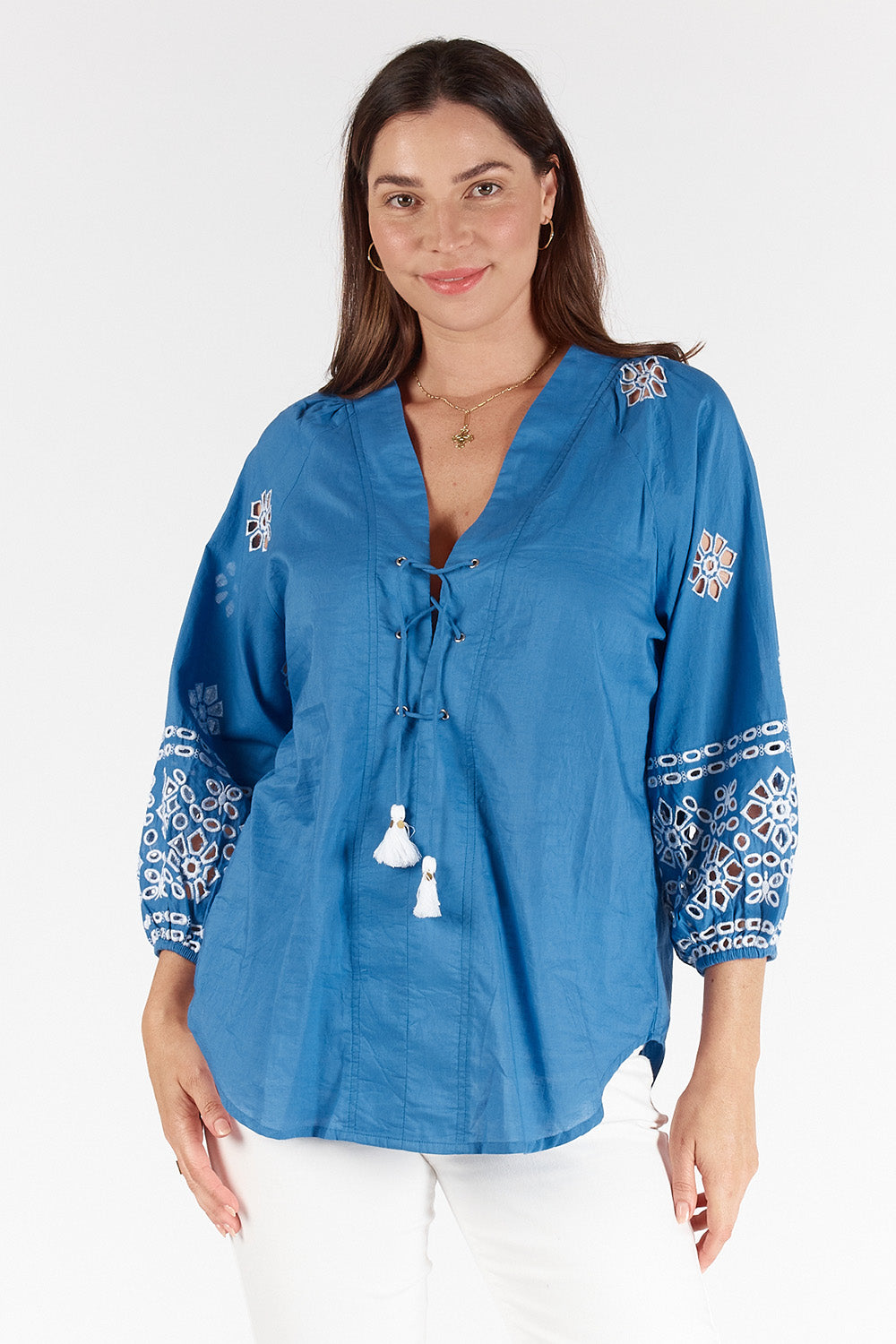 A model wearing the St Luca Cotton Top in colour Ocean (Blue), from the front, cropped image