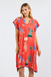 Model Genericm wearing size sample of the Summer Vibes Dress – Melon in colour Melon, in a cropped view