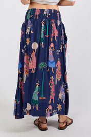 Model Genericm wearing size sample of the Summer Vibes Skirt – Navy in colour Navy, from the back