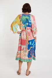 A model wearing the Taj Kaftan in colour Multi, from the back