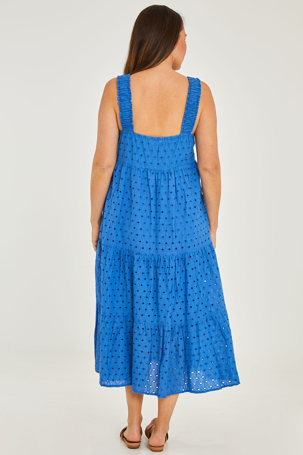 Model Georgia wearing size S of the Tarnee Sundress in colour Ocean (Blue), from the back