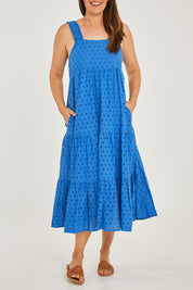 Model Georgia wearing size S of the Tarnee Sundress in colour Ocean (Blue), from the front, cropped image