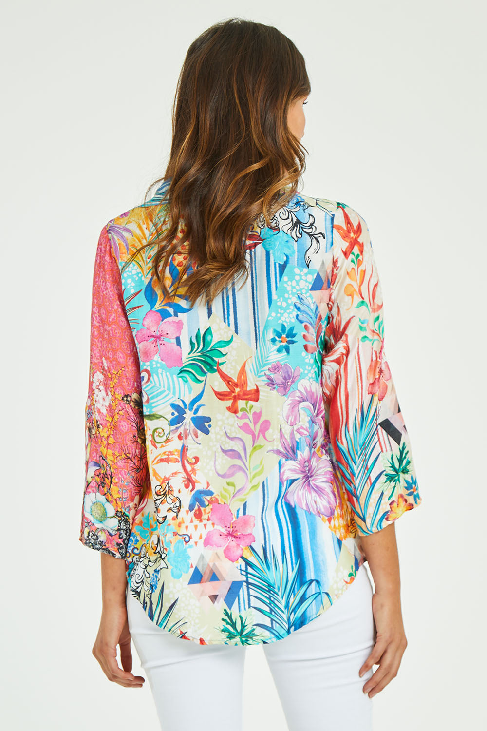 Model Madeline wearing size S of the Velma Shirt in colour Multi (Blue), from the back