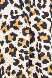 Product shot of the Wild Safari Dress - Print in colour Print, showing detail