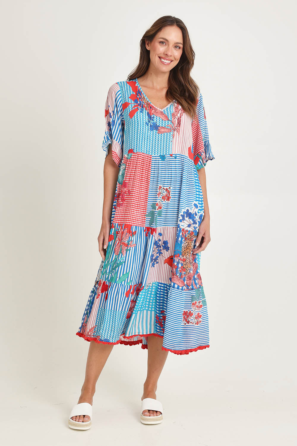 Model Madeline wearing size S of the Wymara Midi Dress in colour Print, from the front, showing the whole outfit