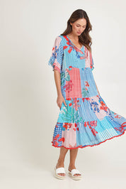 Model Madeline wearing size S of the Wymara Midi Dress in colour Print, from the front, showing the whole outfit
