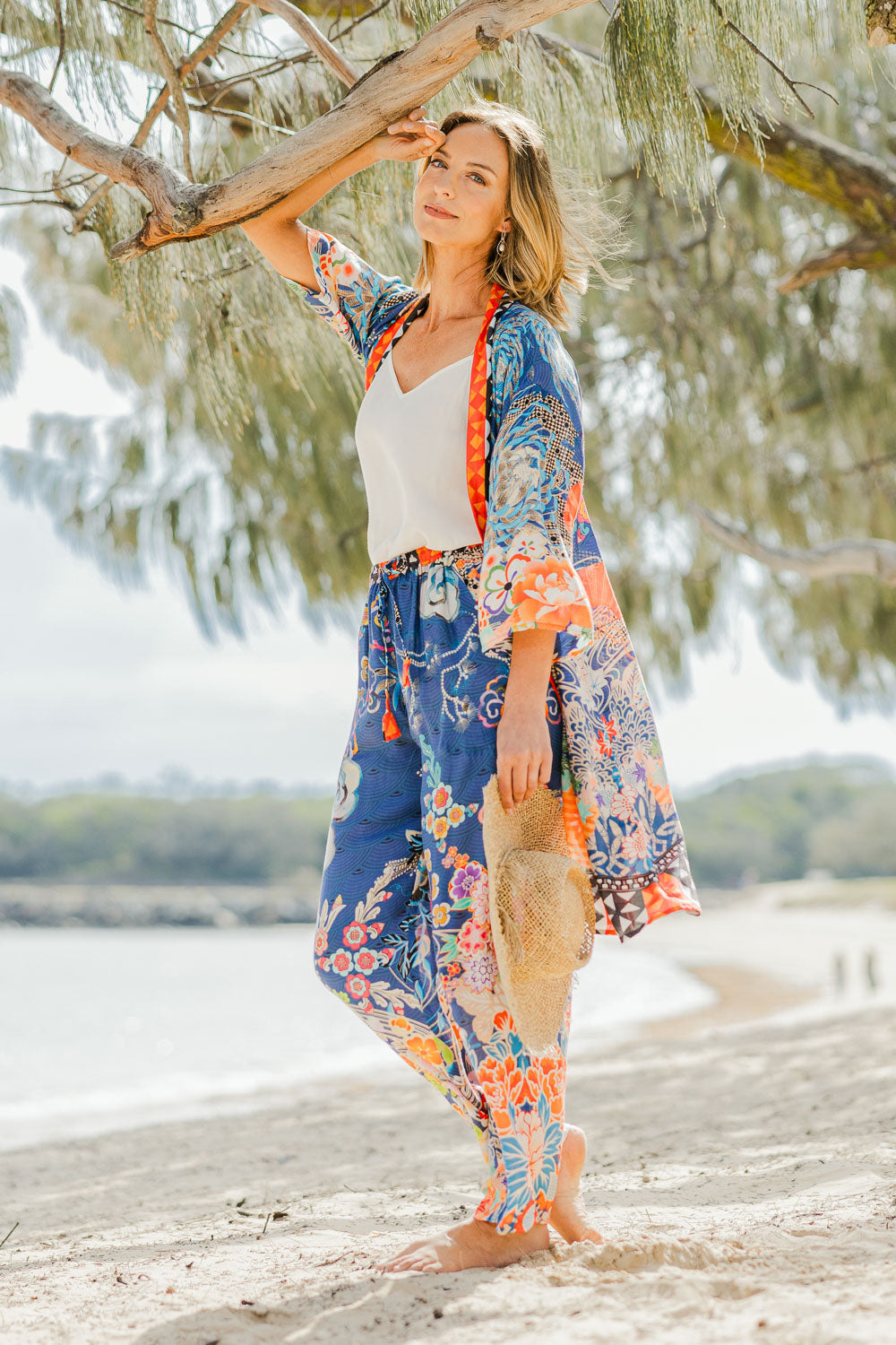 Model Riina wearing the Yoko Kimono in colour Navy (Blue), from the front, showing the whole outfit