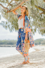 Model Riina wearing the Yoko Kimono in colour Navy (Blue), from the front, showing the whole outfit