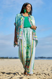 Model Eshan wearing size 10 of the Zilara Pant – Mist in colour Mist, from the front