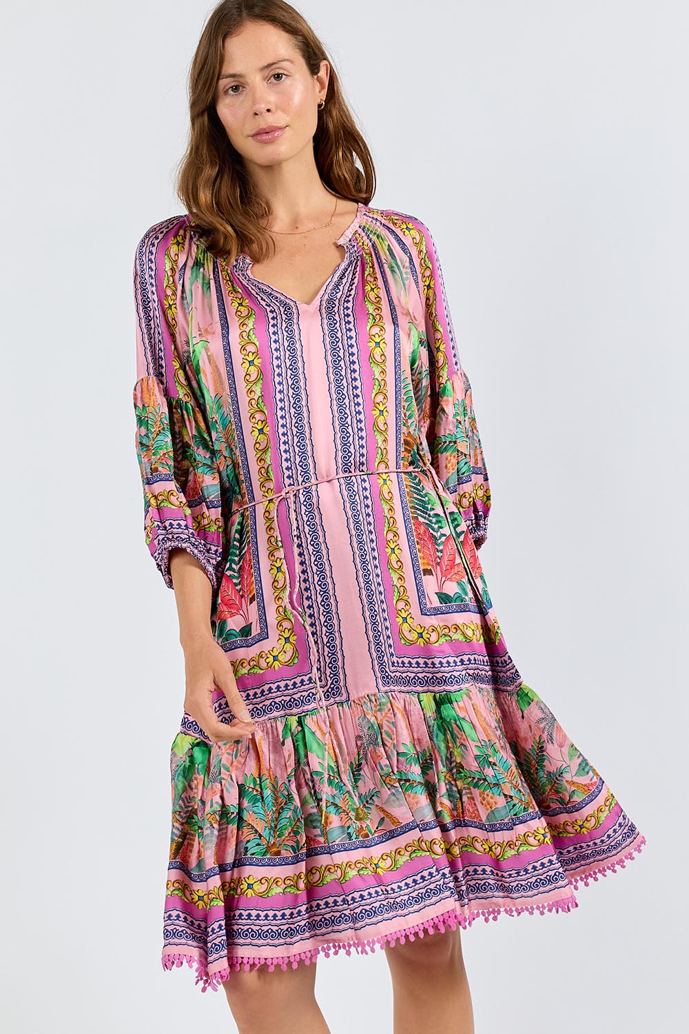 Model Genericm wearing size sample of the Zilara Dress – Orchid in colour Orchid, in a cropped view